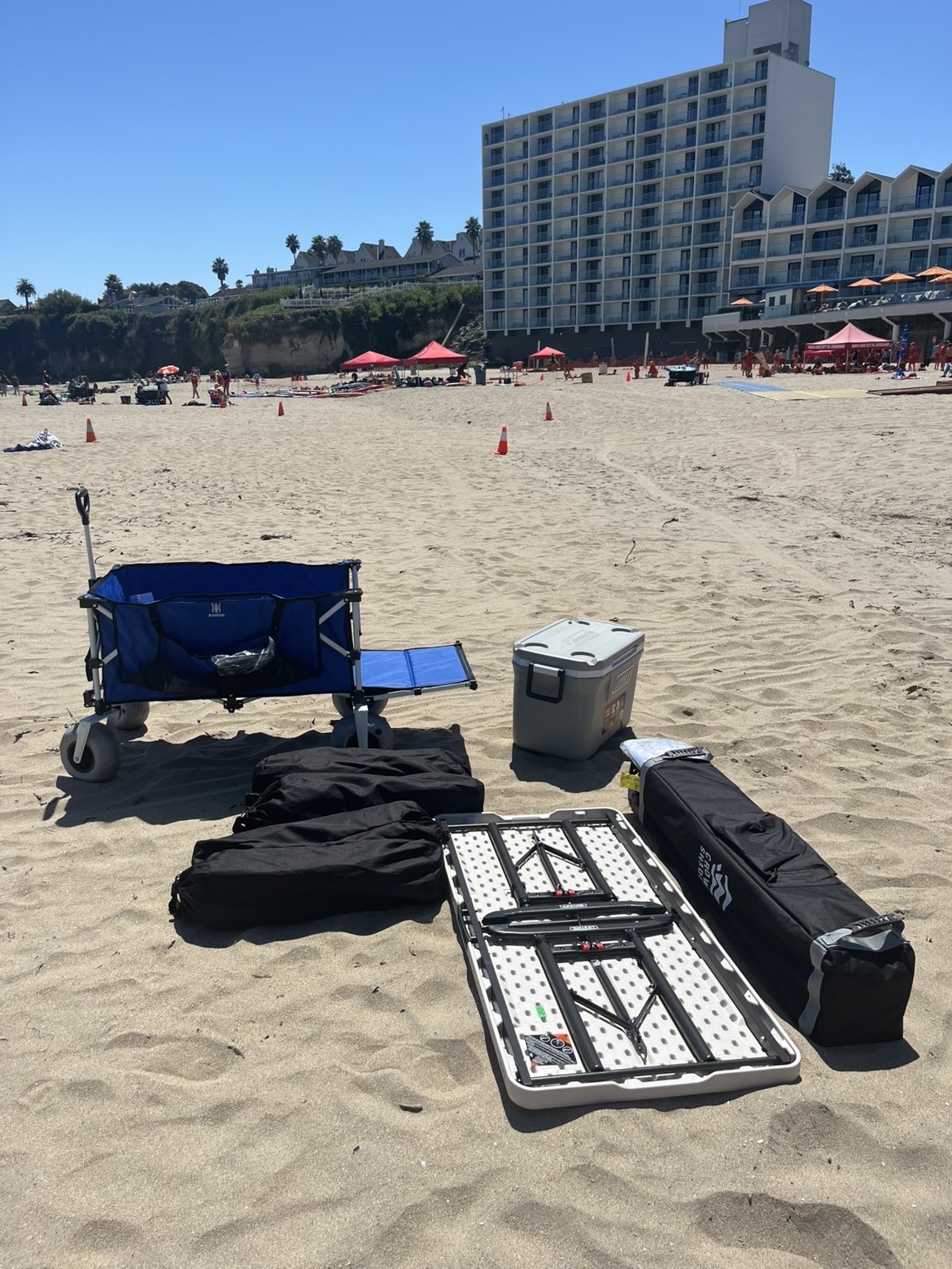 Unpacking the gear on the sand