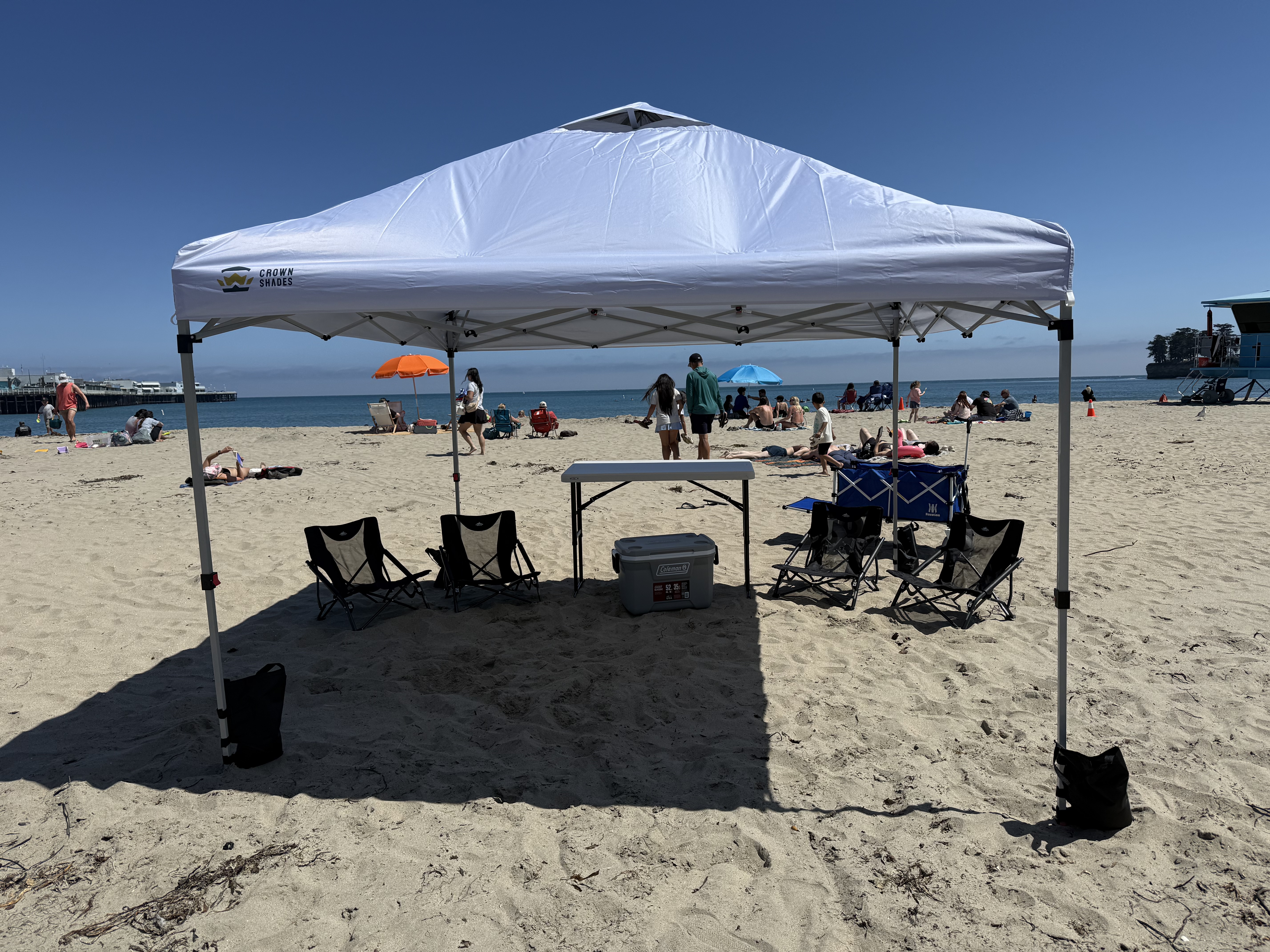 Cabana setup with Santa Cruz beachfront and hotel in background